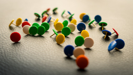 collection of push pins with white background