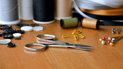 Small silver sewing scissors.