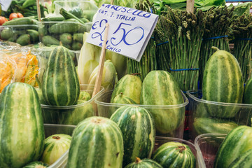 Stall with carosello melons on covered food market - Mercato Delle Erbe in historic part of Bologna city, Italy © Fotokon