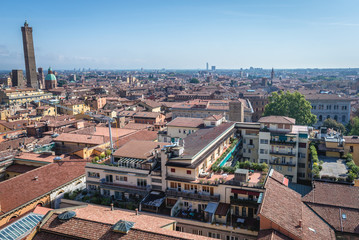 Fototapeta na wymiar Panorama of historic part of Bologna city, Italy - view from St Petronius Basilica with Two Towers on left side