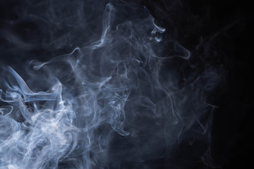white flowing smoke cloud on black background