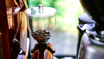 Close-up view of coffee grinder in a coffee shop