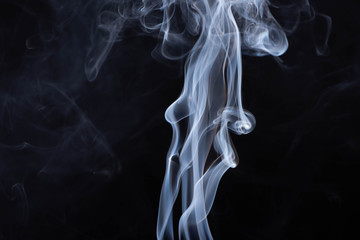 abstract white flowing smoke on black background