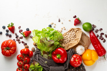 Purchase healthy vegan food. Top view shopping  nowaste bag with healthy food