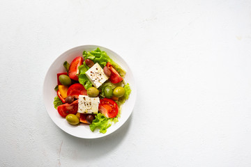 Colorful fresh vegetable mediterranean salad with feta
