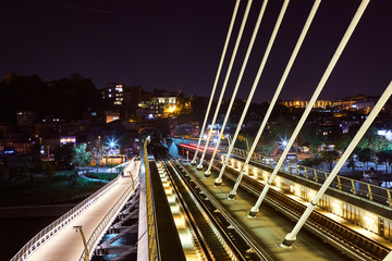 Fototapeta na wymiar Ataturk metro bridge and golden horn at night - Istanbul, Turkey