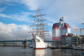 Gothenburg , Sweden – October 17, 2019: Gothenburg harbour with a vessel  and the building...