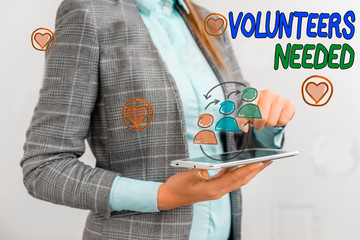 Conceptual hand writing showing Volunteers Needed. Concept meaning need work or help for...