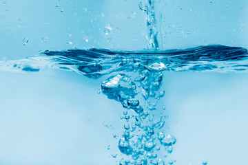 Water droplets moving in waves