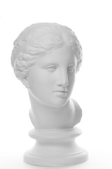 Gypsum copy of ancient statue Venus head isolated on white background. Plaster sculpture woman face.