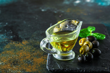 olive oil appetizer olives, cold pressed, 
menu concept food background. top view. copy spaces for text for text
keto or paleo diet