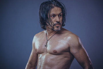 Obraz premium sexy muscular body model portrait of a young man