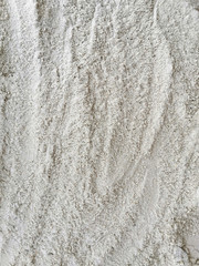 Beach sand background texture for holiday design.