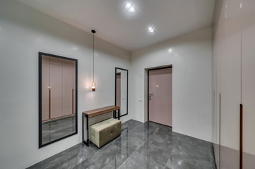 Interior of a modern loft style apartment. Spacious hallway