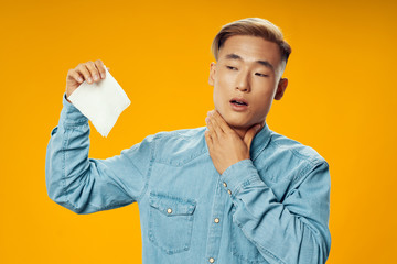 young man holding a blank card