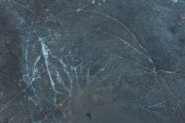 Texture of hot ice with large white cracks.