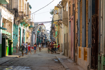 Fototapeta na wymiar Havana Old Town Street with Local People and Tourist. Cuba.