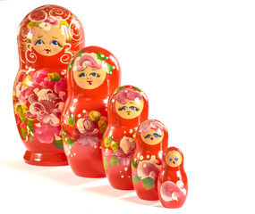 red matryoshka on white background