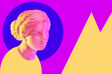 Statue of Venus de Milo. Creative concept colorful neon image with ancient greek sculpture Venus or Aphrodite head. Webpunk, vaporwave and surreal art style. Pink and yellow duotone effects. © Ded Pixto