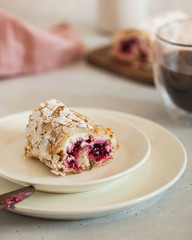  Dessert pistachio roll with raspberry filling. Food photo with space for text, concept of sweets, menu for cafe.