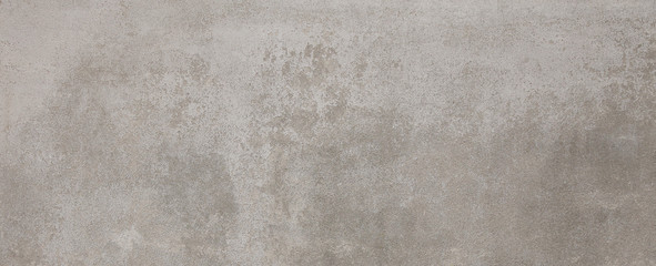 La texture du mur gris en béton peut être utilisée comme arrière-plan