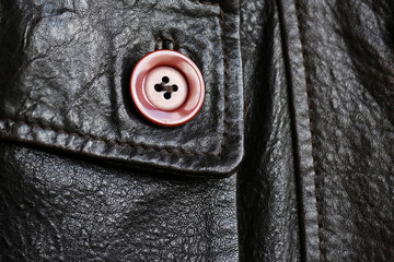 A fragment of outerwear made of genuine leather.