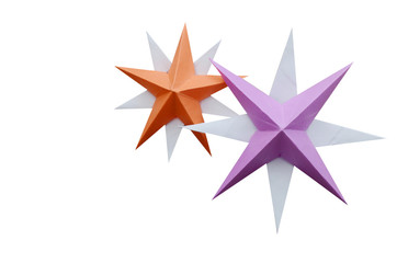 Two origami paper folding stars isolated white background