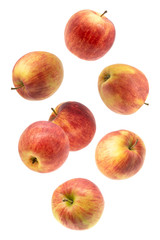 Falling red juicy apple isolated on white background
