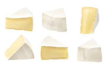 Camembert or brie cheese isolated on white background. Soft cheese covered with edible white mold view from above.