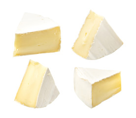 Camembert or brie cheese isolated on white background. Soft cheese covered with edible white mold view from above.