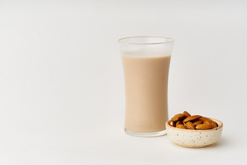 A glass of almond milk. Healthy protein drink suitale for vegans. Dairy alternative