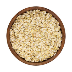 Oat rye flakes in bowl isolated on white background. Top view