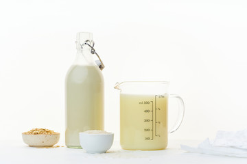 Rice milk and oat milk. Vegan beverage full of proteins. Healthy dairy alternative for lactose intolerance