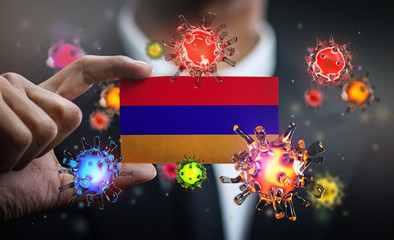 Corona Virus Around Armenia Flag. Concept Pandemic Outbreak in Country