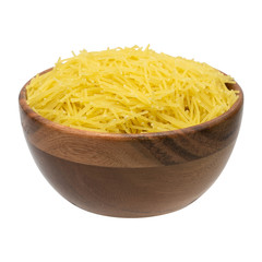 Uncooked vermicelli pasta in wooden bowl. Isolated on white background with clipping path