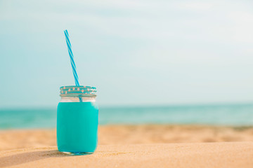 Soft blue drink at the beach