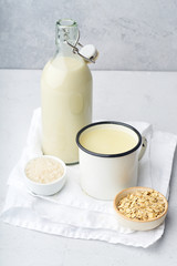 Rice milk and oat milk. Vegan beverage full of proteins. Healthy dairy alternative for lactose intolerance