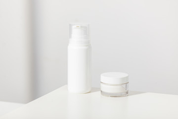 Empty cosmetics on a clean white background mockup