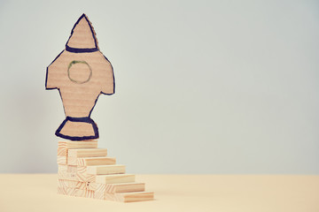 New start mockup. Rocket launch, copy space. New business and life challenge concept. Paper...