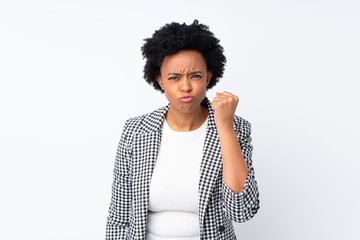 African american woman with blazer over isolated white background with angry gesture