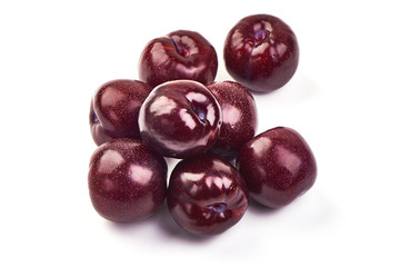 Sweet red plums, isolated on white background
