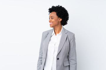 African american business woman over isolated white background looking to the side