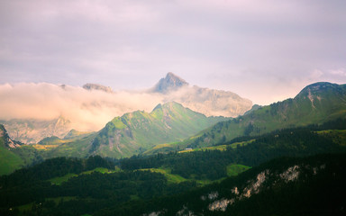 Plakat mountains in switzerland at sunset in summer