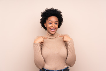 African american woman over isolated background with surprise facial expression