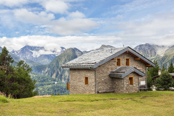 Fototapeta na wymiar house in the mountains of switzerland, high mountain village