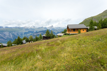 Fototapeta na wymiar house in the mountains of switzerland, high mountain village