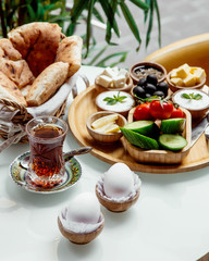 breakfast set and black tea in armudu glass