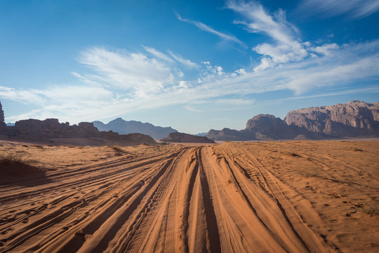 Desert Road In Wadi Rum, Jeep Traces In The Sand