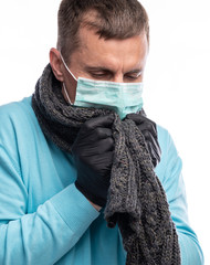 Man in protective mask and gloves suffering from influenza over white background