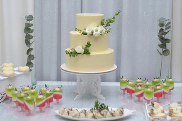 Wedding sweet table with cake and desserts
